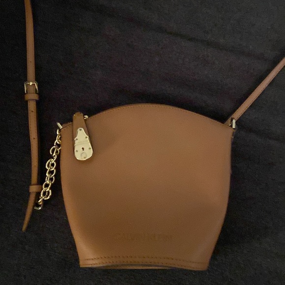 Brown, adjustable crossbody, Calvin Klein purse with gold hardware. - Picture 2 of 12